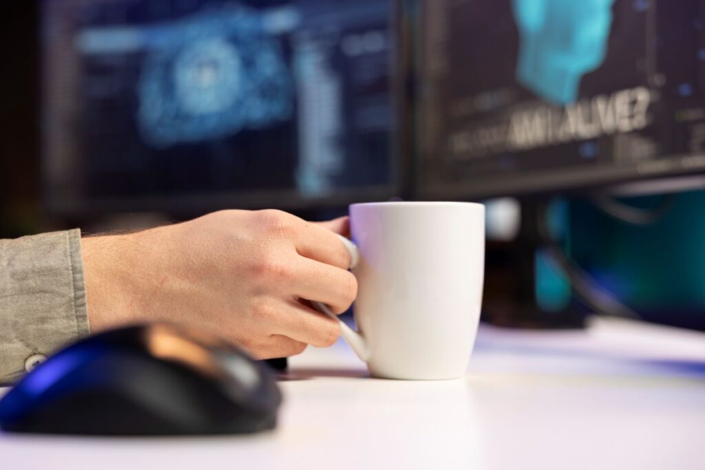 Close up man holding coffee mug talking with artificial intelligence